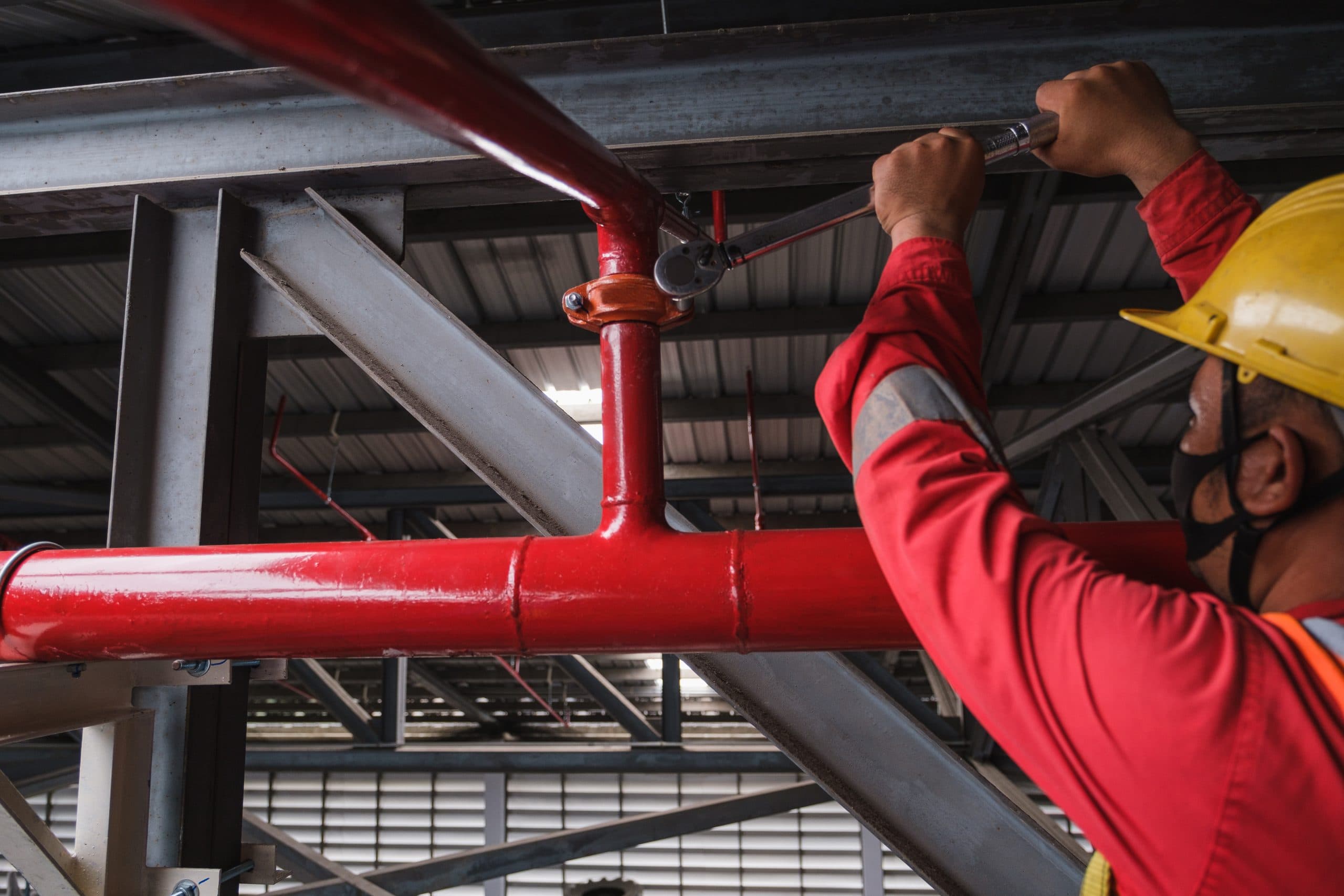 Fire-protection inspector checking a sprinkler system
